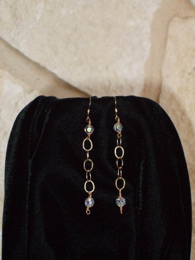 Add some bling to your life with these elegant 14K GF Chain and Swarovski Crystal earrings.  (C120P103) - Click for more details