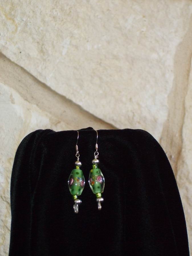Earrings of Italian Glass and Sterling Silver beads accented by green glass beads.  (C120P104) - Click for more details