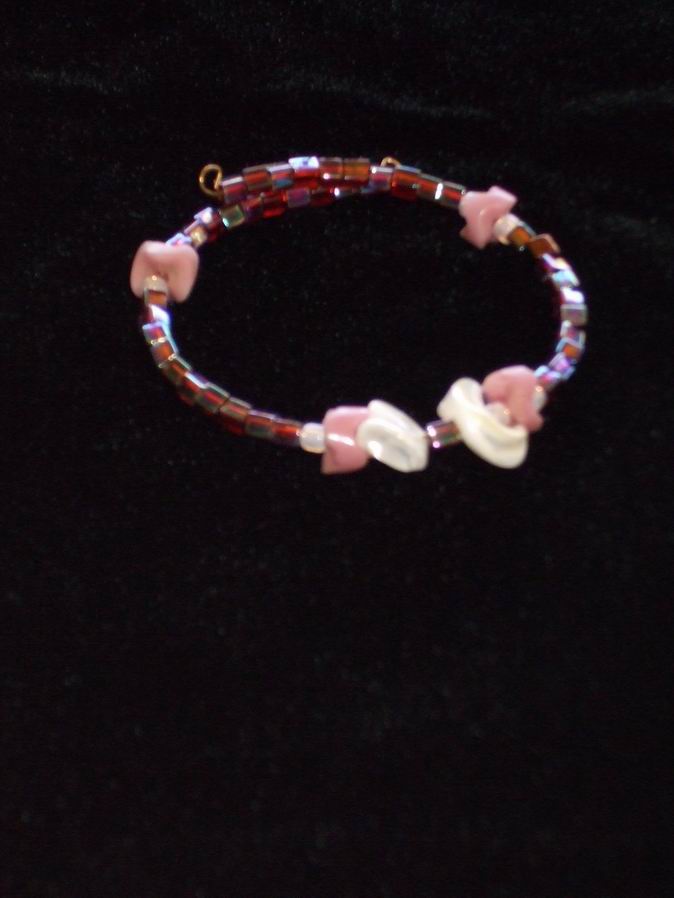 Iridescent burgundy & cream glass beads with shell & rose African Stone accents. Gold memory wire.  (C120P108) - Click for more details