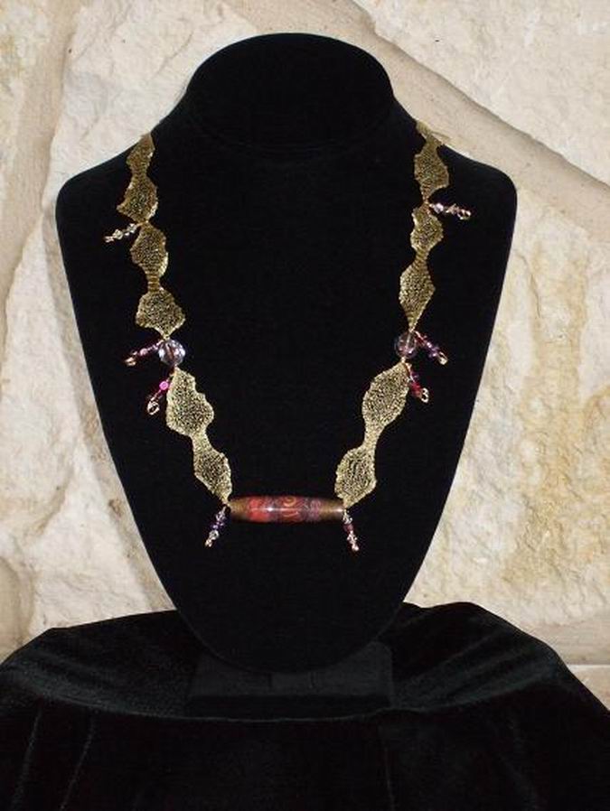 Handmade paper pendant, Czech and other glass beads on Italian gold mesh wire. Clasp is 14kt GF.  (C120P128) - Click for more details