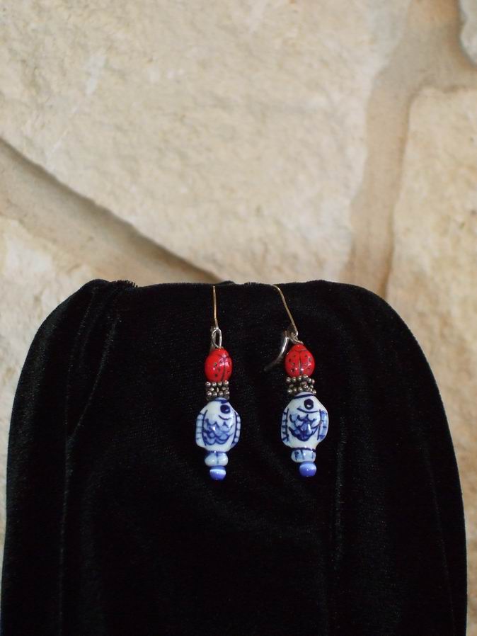 Blue and white porcelain fish with red lady bug and bali sterling silver beads and ear wires.  (C120P151) - Click for more details