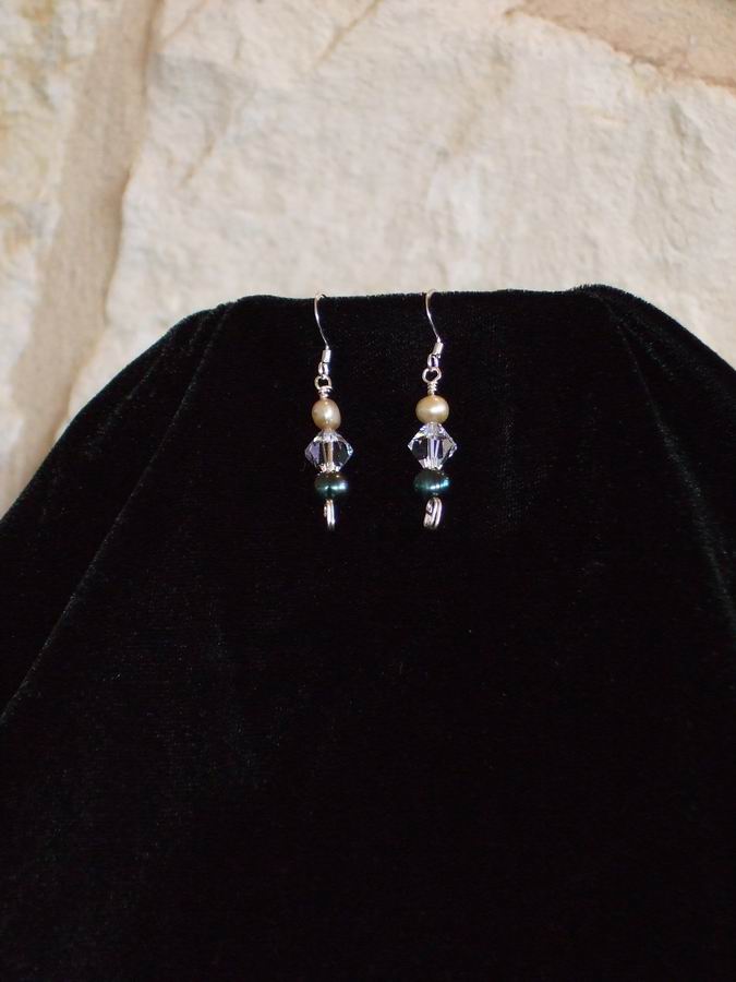 Freshwater pearls and Swarovski Crystals on sterling silver ear wires.  (C120P173) - Click for more details