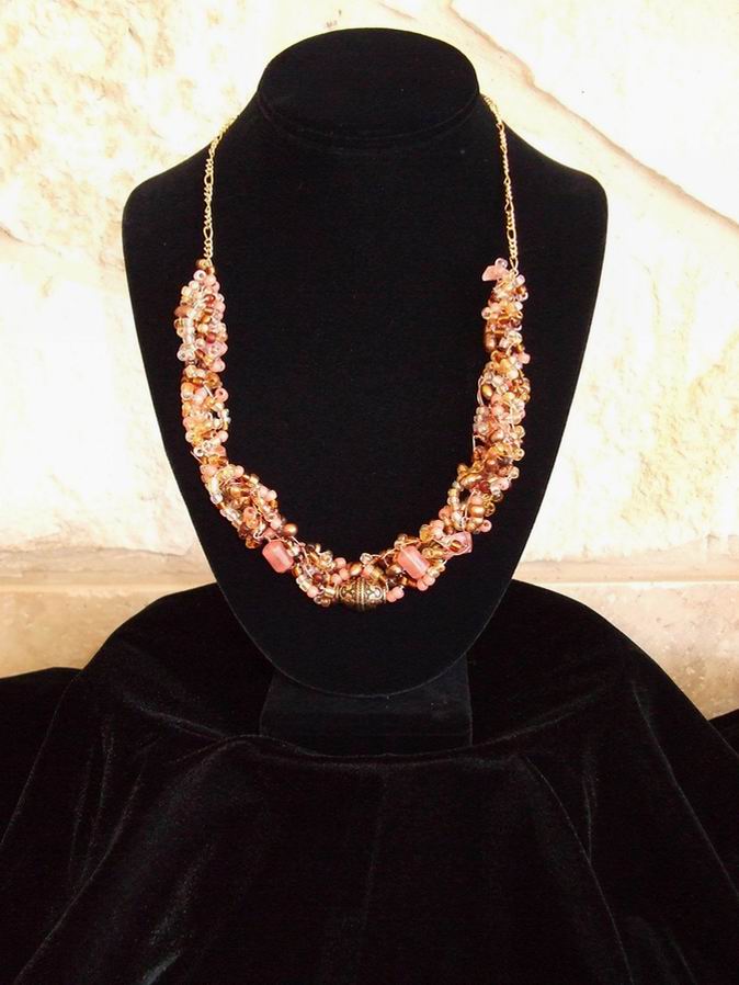 Coral, bronze, and copper beads on copper Artistic wire. Gold metal chain with 14K GF clasp.  (C120P68) - Click for more details