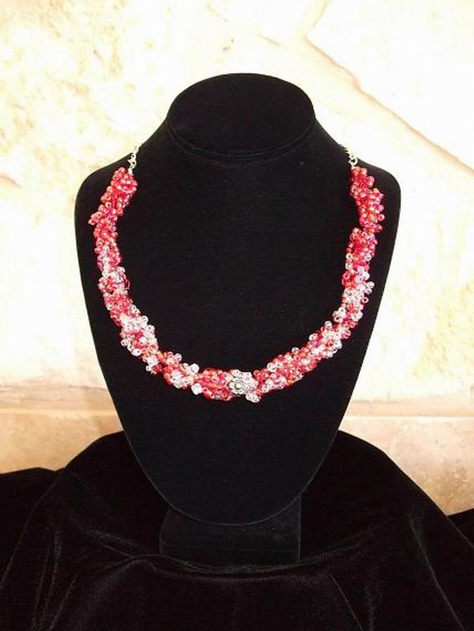Red and clear glass beads on Sterling Silver Artistic Wire. Silver flower accents the center.  (C120P74) - Click for more details